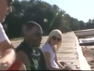 Grand blonde fucked by Bull on boat.